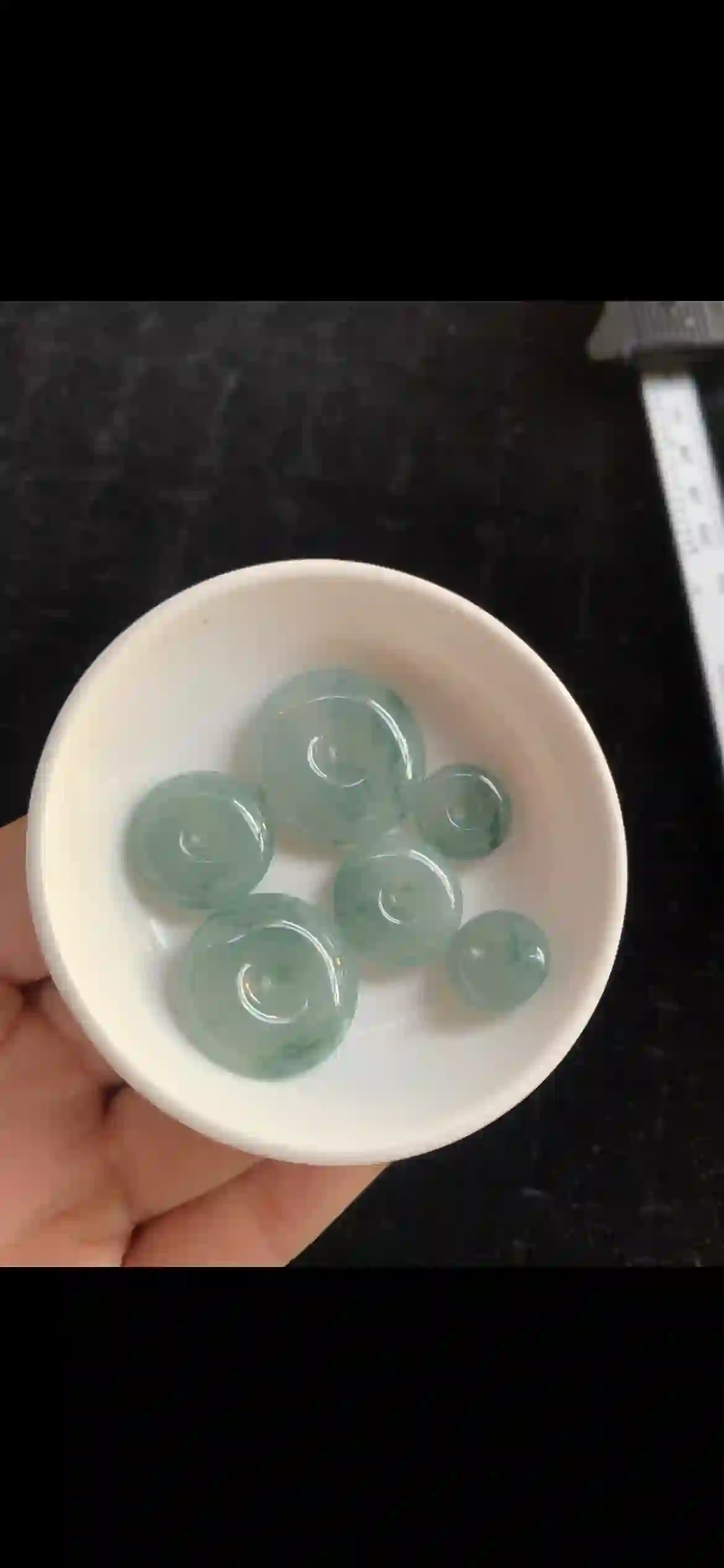 Icy Floating Green Jade Donut Pendants — Set of Six, view 2 | Myanmar Jadeite reference #32010001