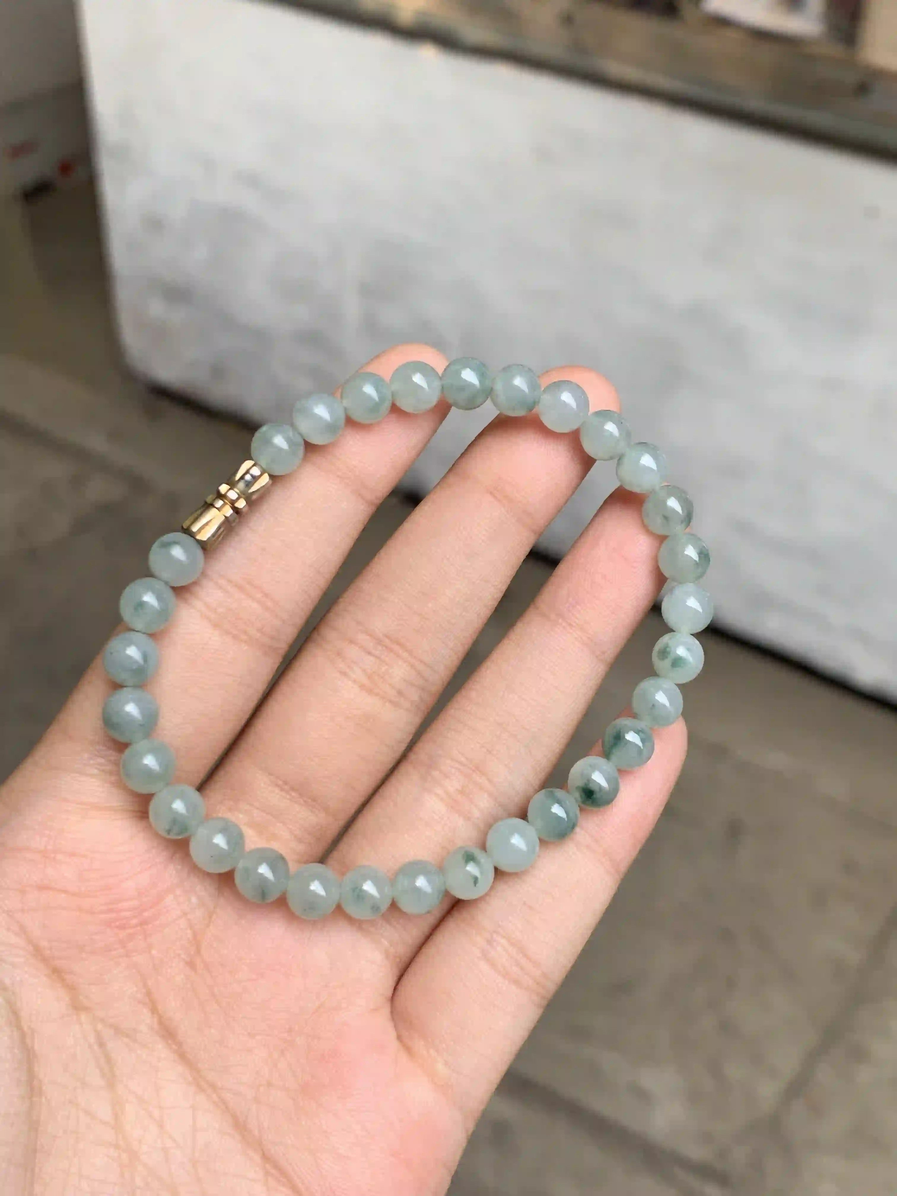 Grayish-Green Jade Bead Bracelet with Gold-tone Clasp, view 2 | Myanmar Jadeite reference #570002