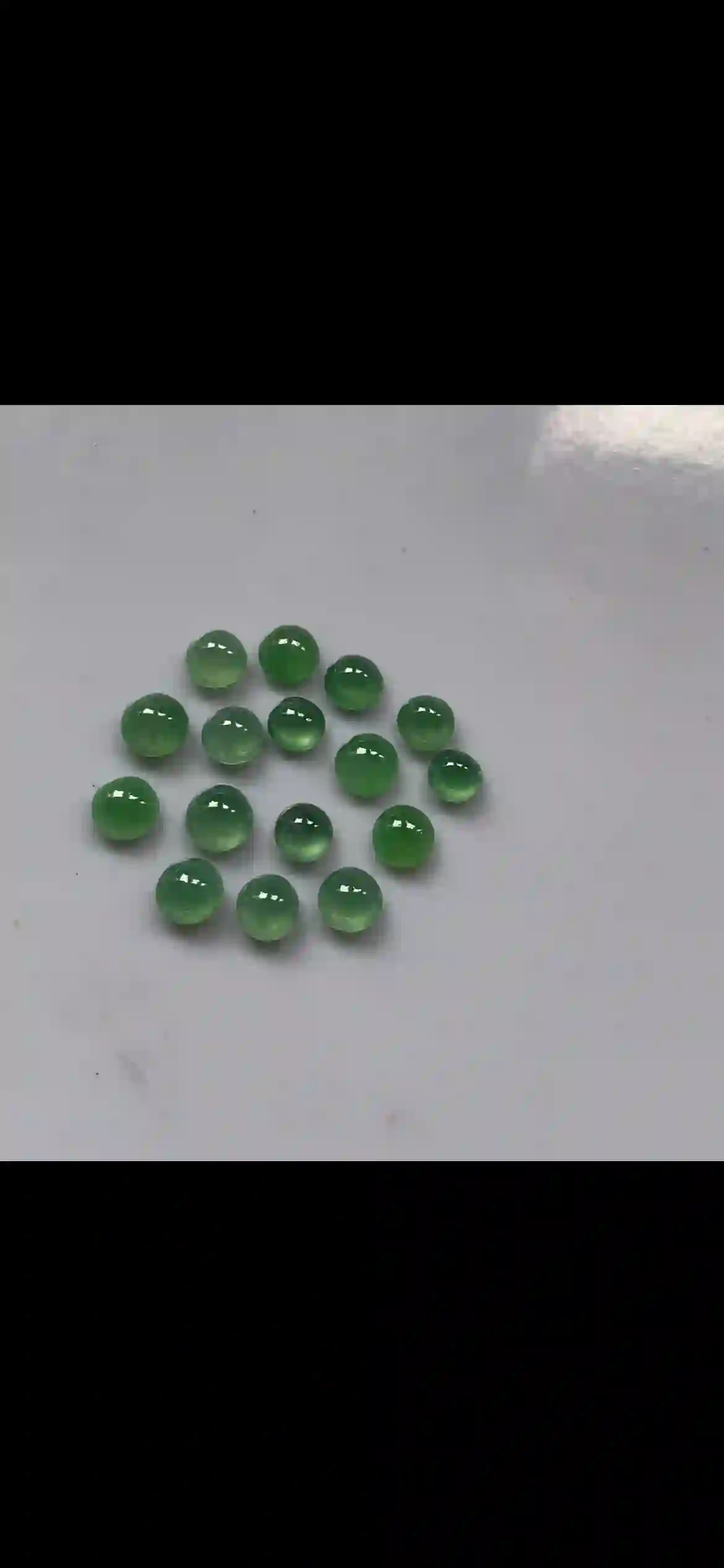 Fine Round Cabochon Green Jadeite Gemstone Collection, view 2 | Myanmar Jadeite reference #23790001