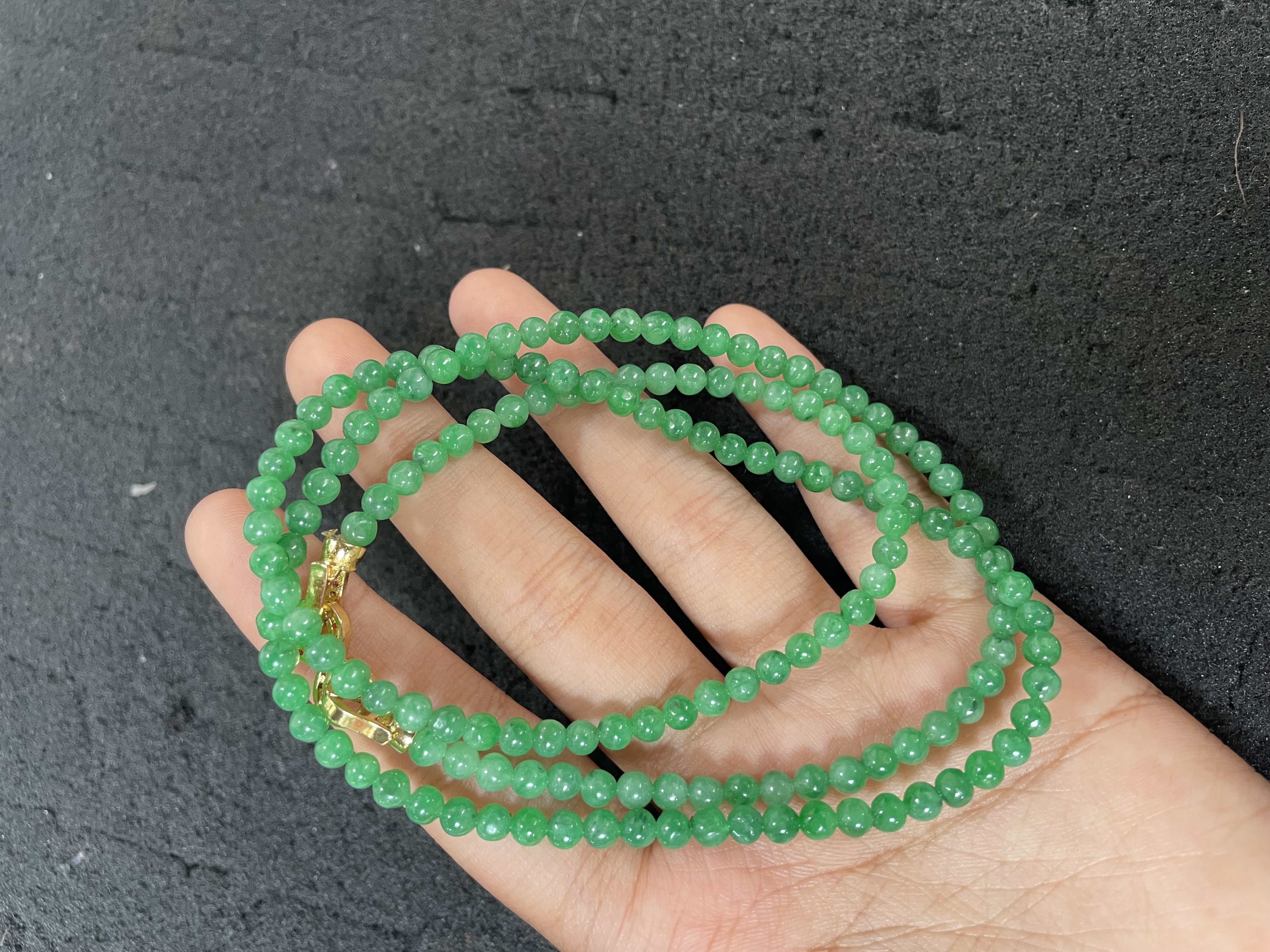 e: Vivid Green Multi-Strand Beaded Necklace with Gold-Toned Clasp