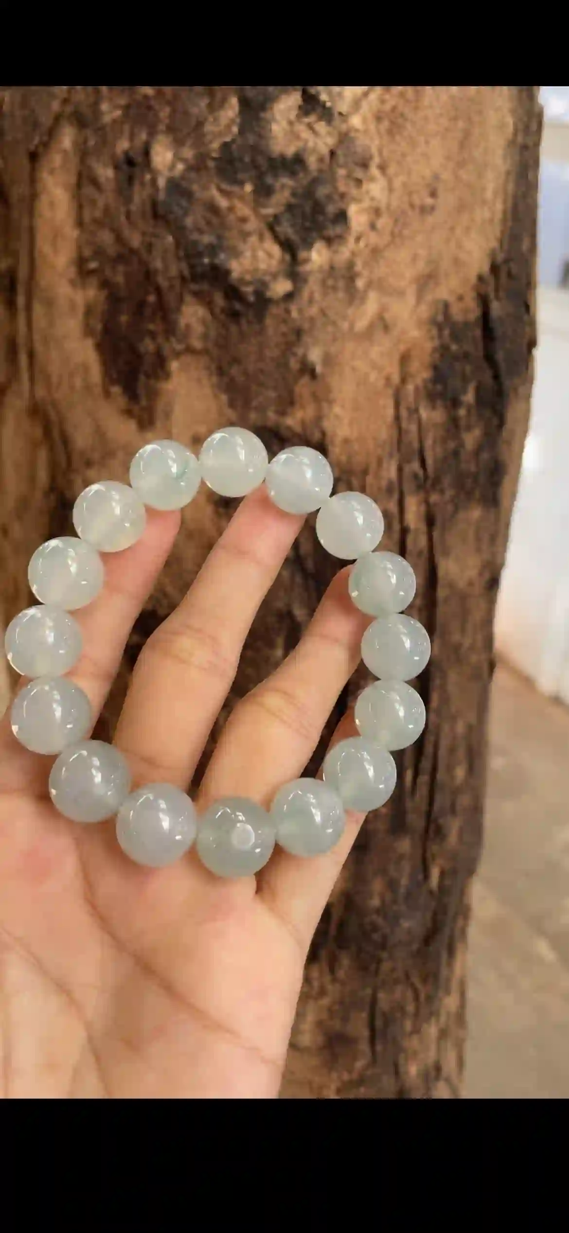 This exquisite bracelet features large, perfectly round icy jade beads with a soft pale blue‑green hue, outstanding glass‑like translucency, and a smooth mirror, view 2 | Myanmar Jadeite reference #14280001