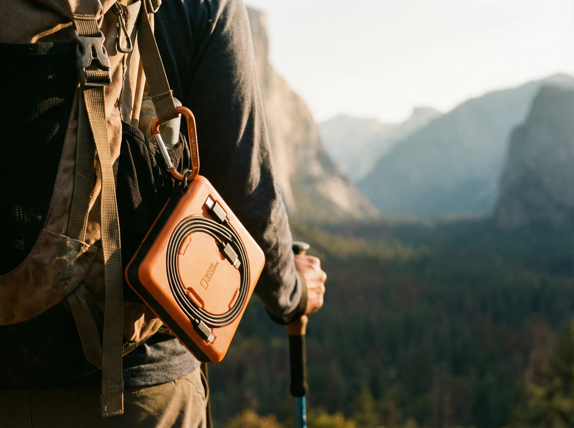 Power bank clipped to backpack