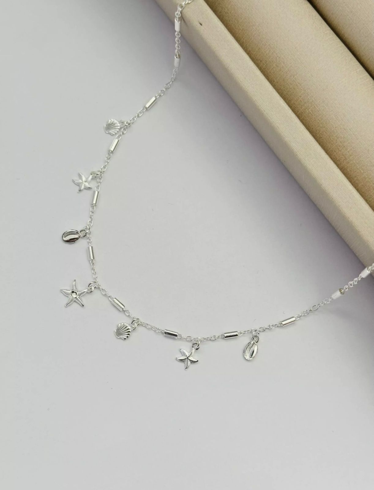 Choker Estrelas e Conchas Prata