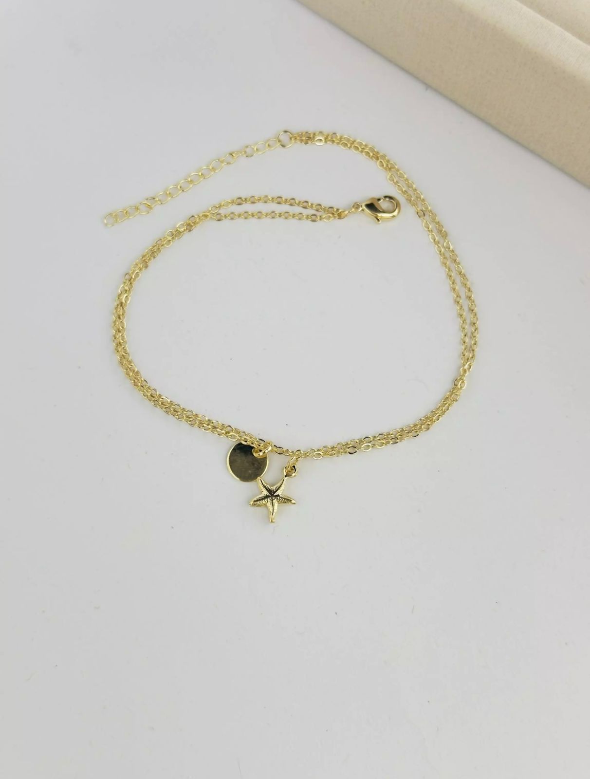 Tornozeleira Estrela do Mar e Medalha Dourada