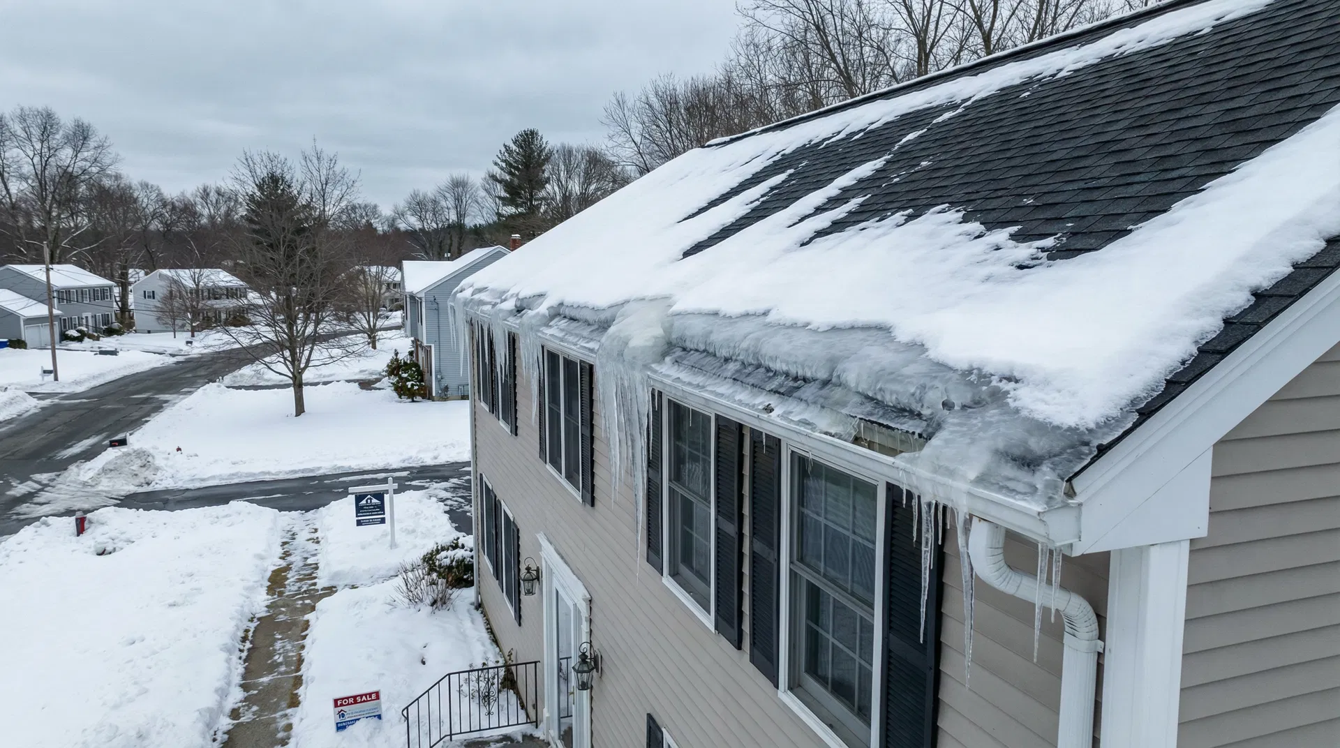 The Ice Dam Autopsy: Why Your Ceiling Leaks After Every Snowstorm in Western MA