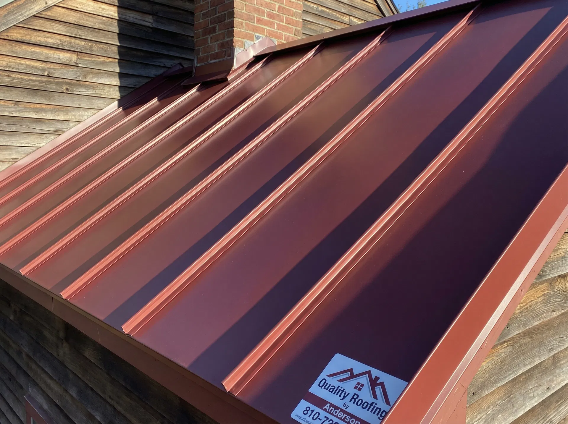 Barn Red standing seam metal roof close-up