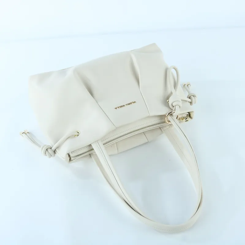 Elegant Creamy White Tote Bag with Drawstring Detail – Soft Vegan Leather Shoulder Bag - Side View