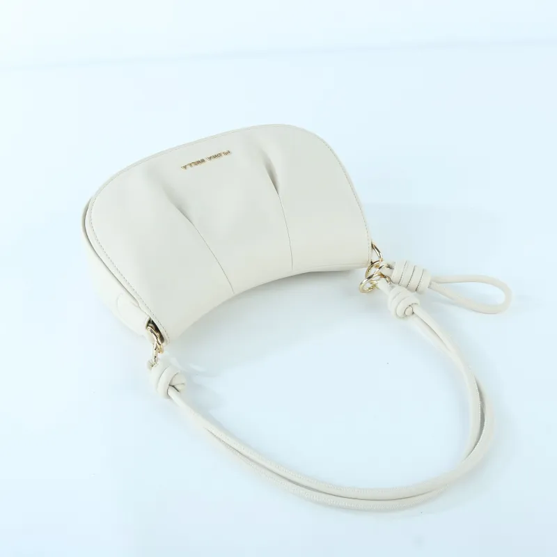 Elegant Off-White Saddle Bag with Knot Strap Detail | Versatile Crossbody & Shoulder Bag - Side View