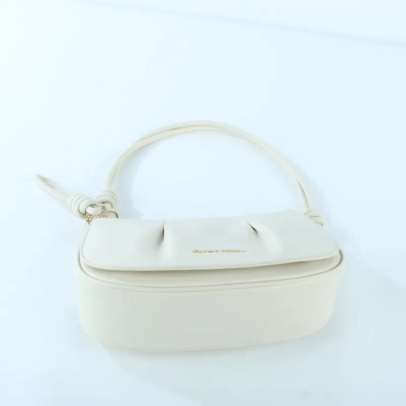 Elegant Off-White Saddle Bag with Knot Strap Detail | Versatile Crossbody & Shoulder Bag - Side View