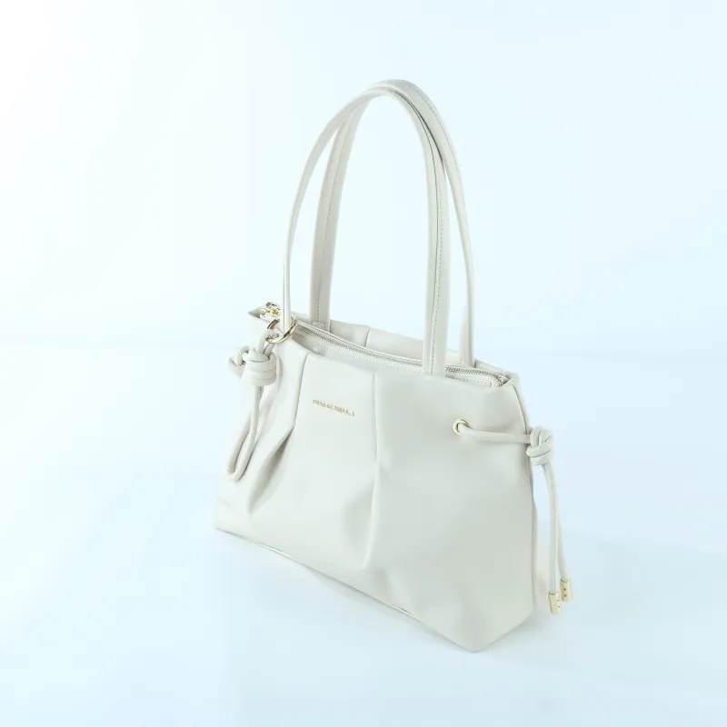 Elegant Creamy White Tote Bag with Drawstring Detail – Soft Vegan Leather Shoulder Bag - Side View