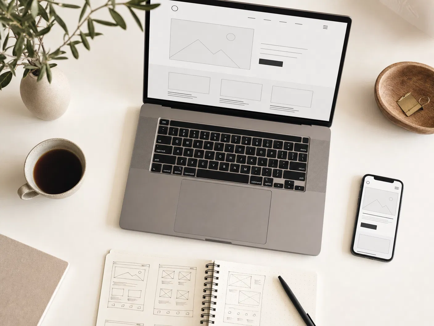 Website design sketches on a workbench