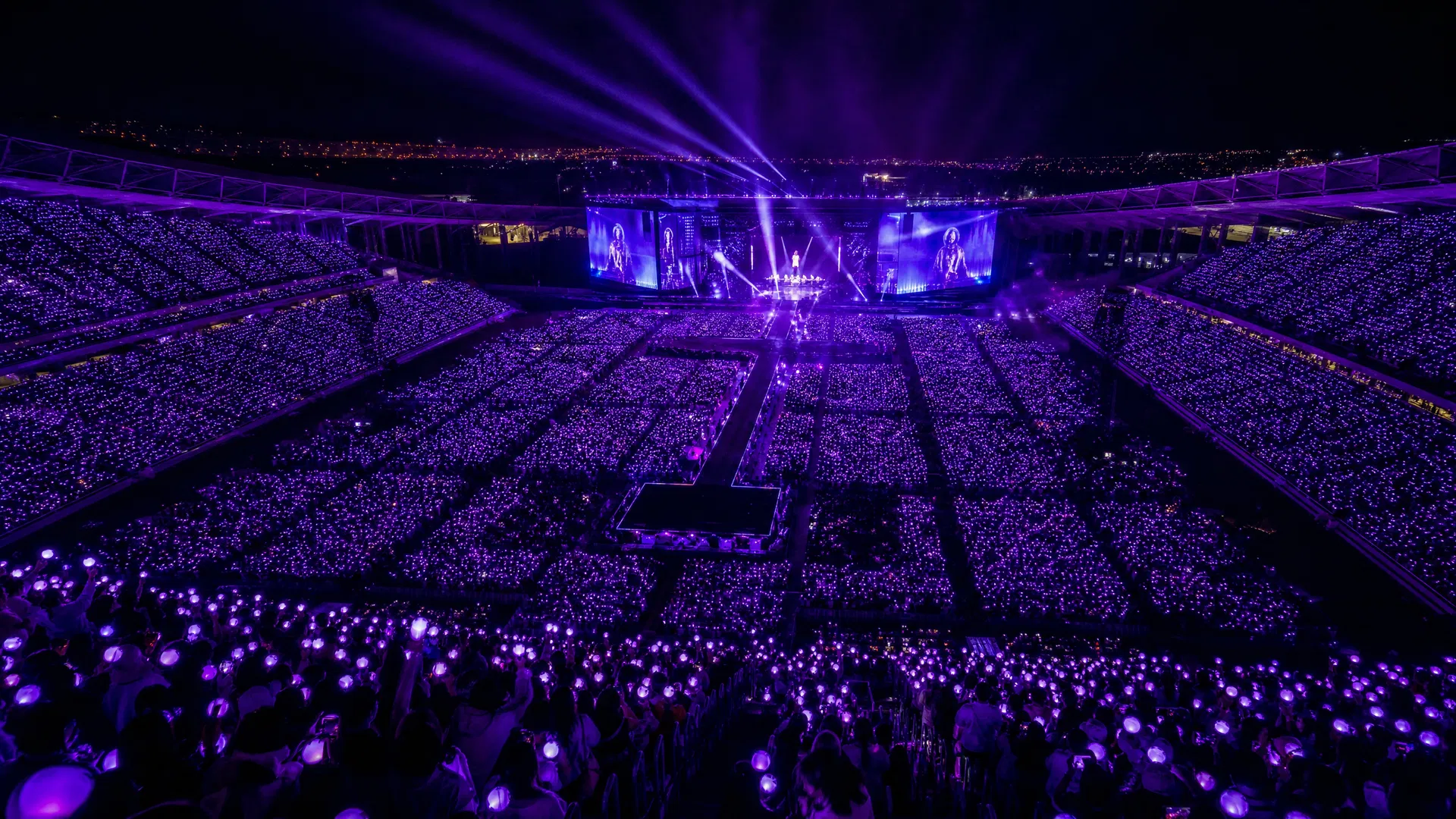 ARMY concert with purple lightsticks