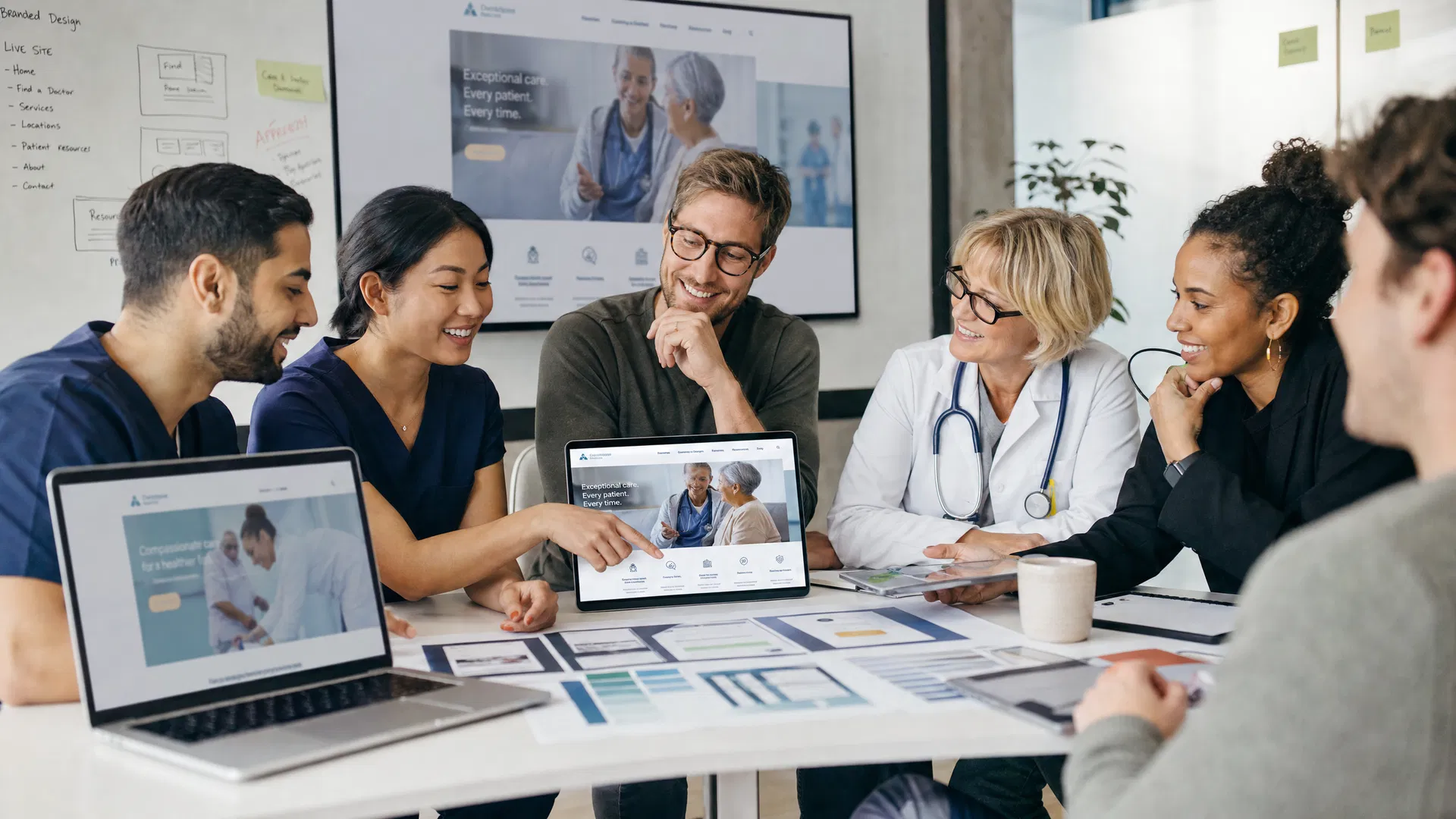 Healthcare team collaborating on website design