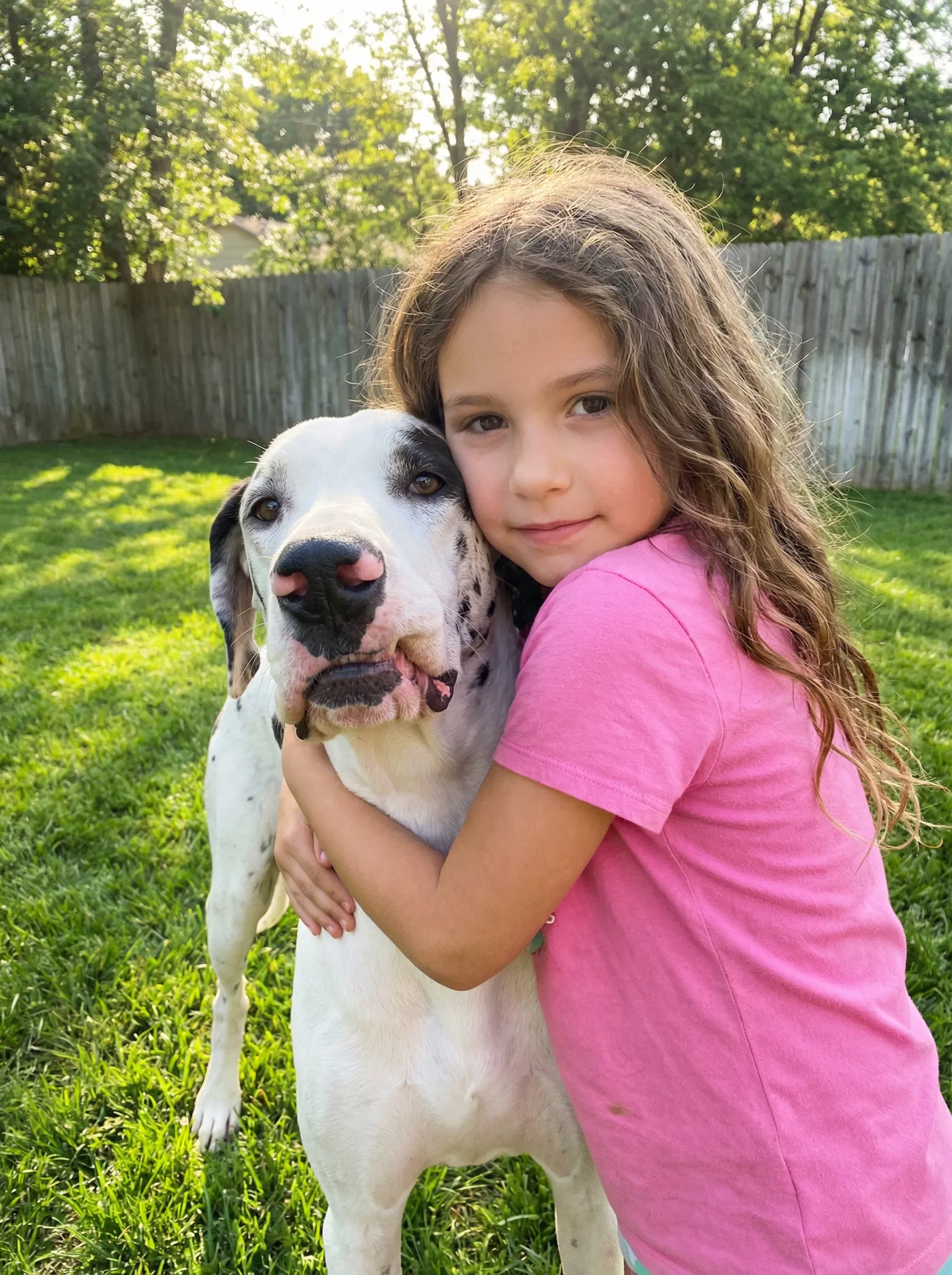 Happy girl with her dog