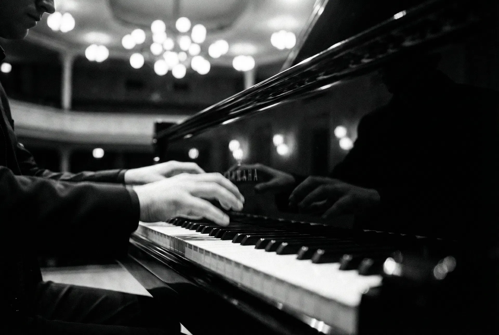 Pianist performing in concert hall