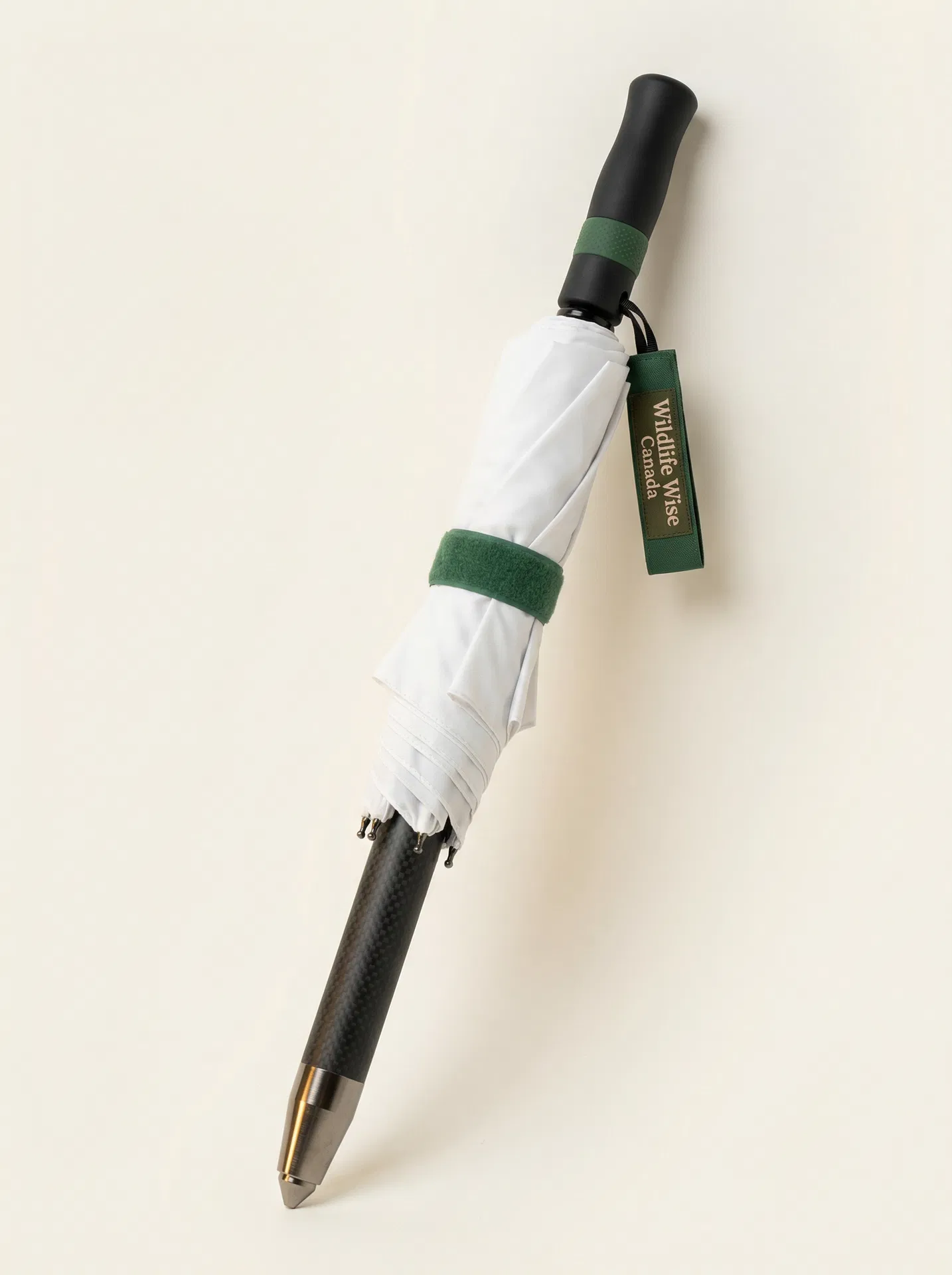 BearBrella closed — carbon fibre shaft and Wildlife Wise Canada tag
