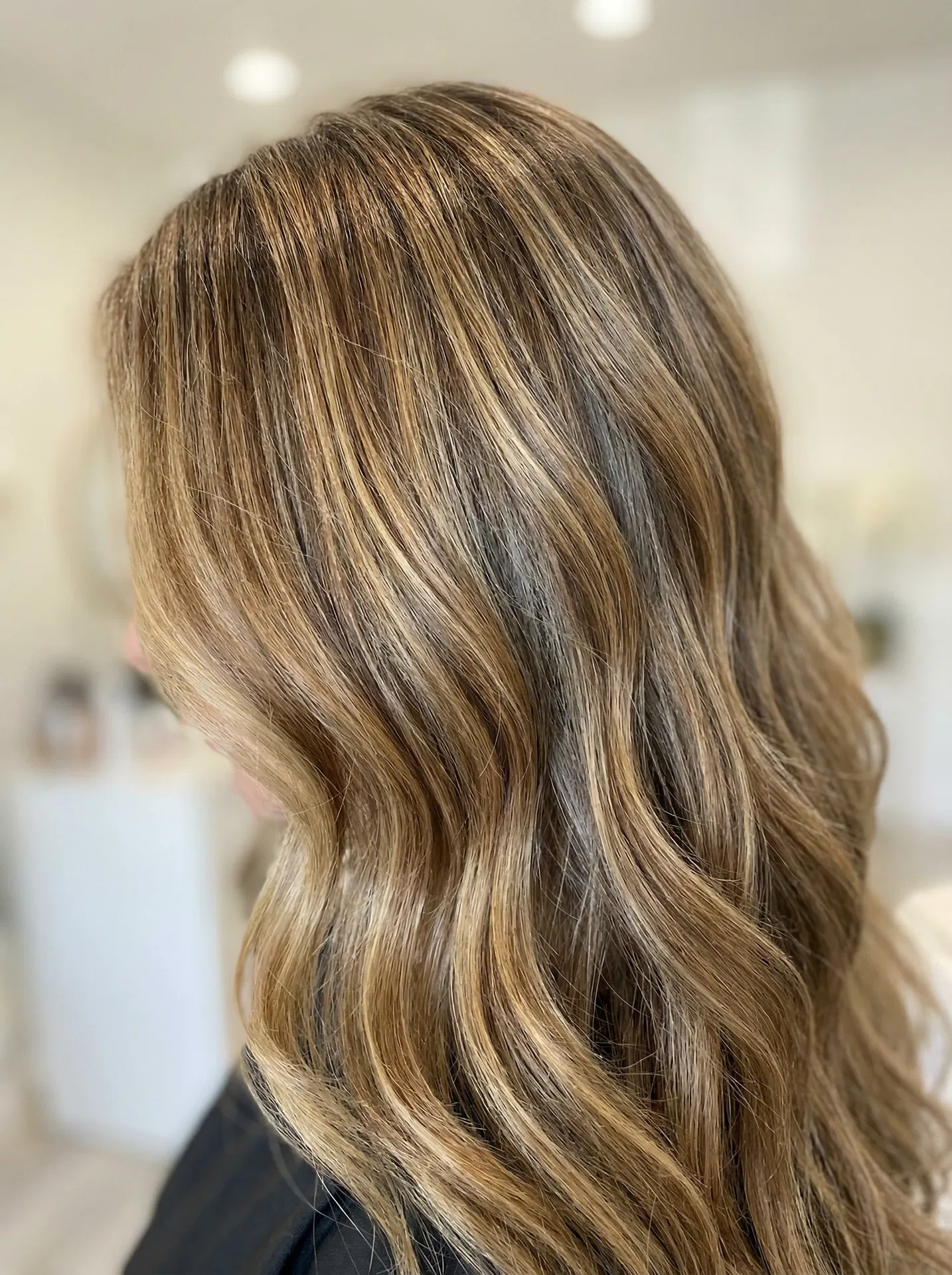 Luxury balayage hair close-up — Level Salon Port Washington