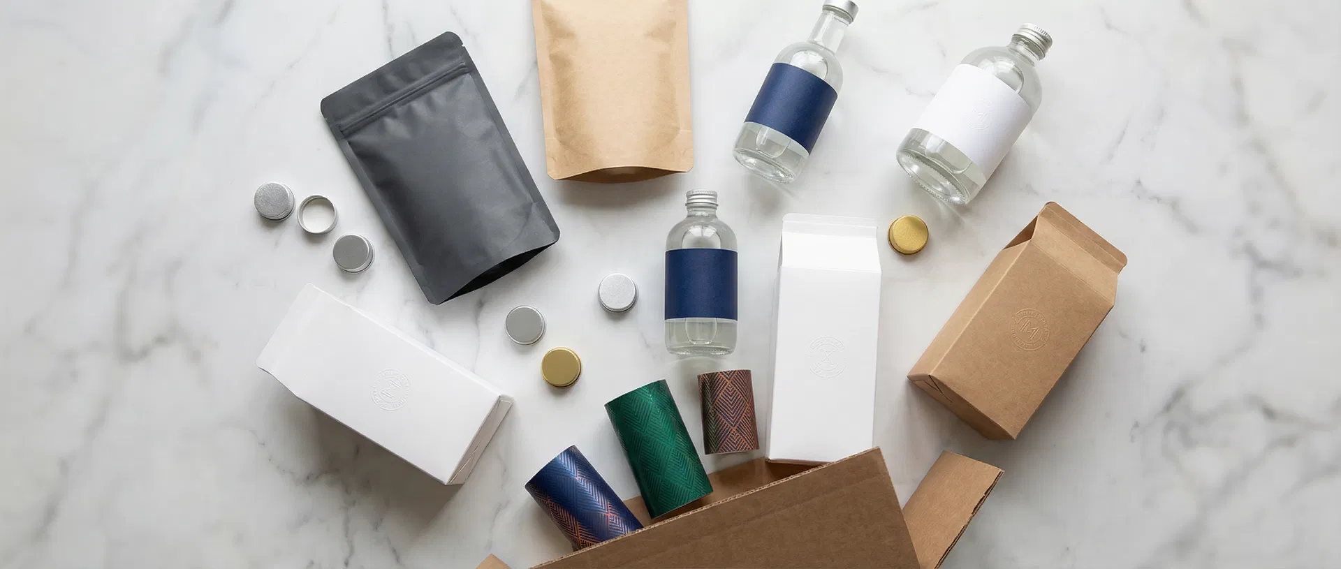 Premium packaging products including bottles, pouches, cartons, and closures