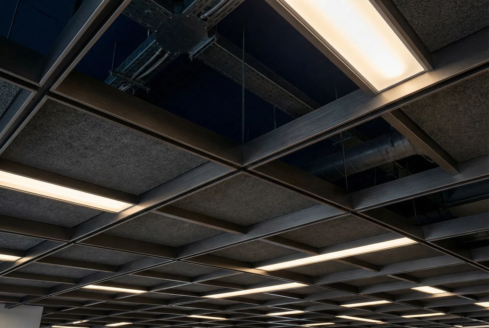 Commercial suspended ceiling grid system with integrated lighting