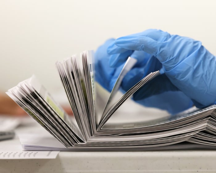 Democratic attorneys general sue Trump over order to restrict mail voting