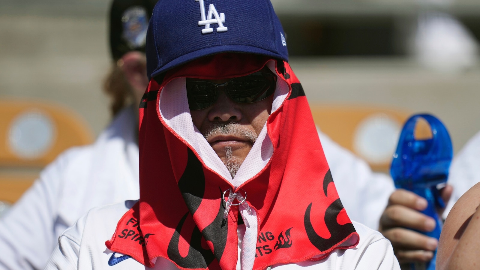 Record temperatures bake the West as heat sickens hundreds at air show