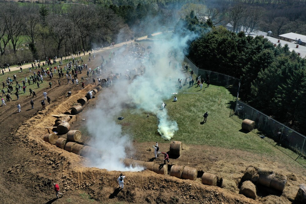 Hundreds trying to storm Wisconsin beagle research facility met with rubber bullets and pepper spray - AP News