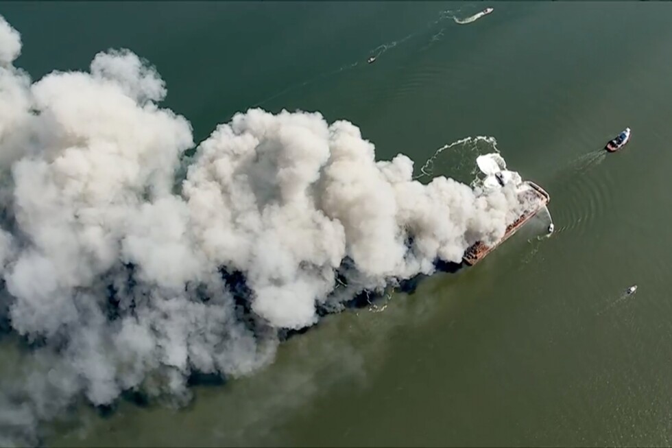 Massive fire breaks out aboard scrap metal barge on Delaware Bay - AP News