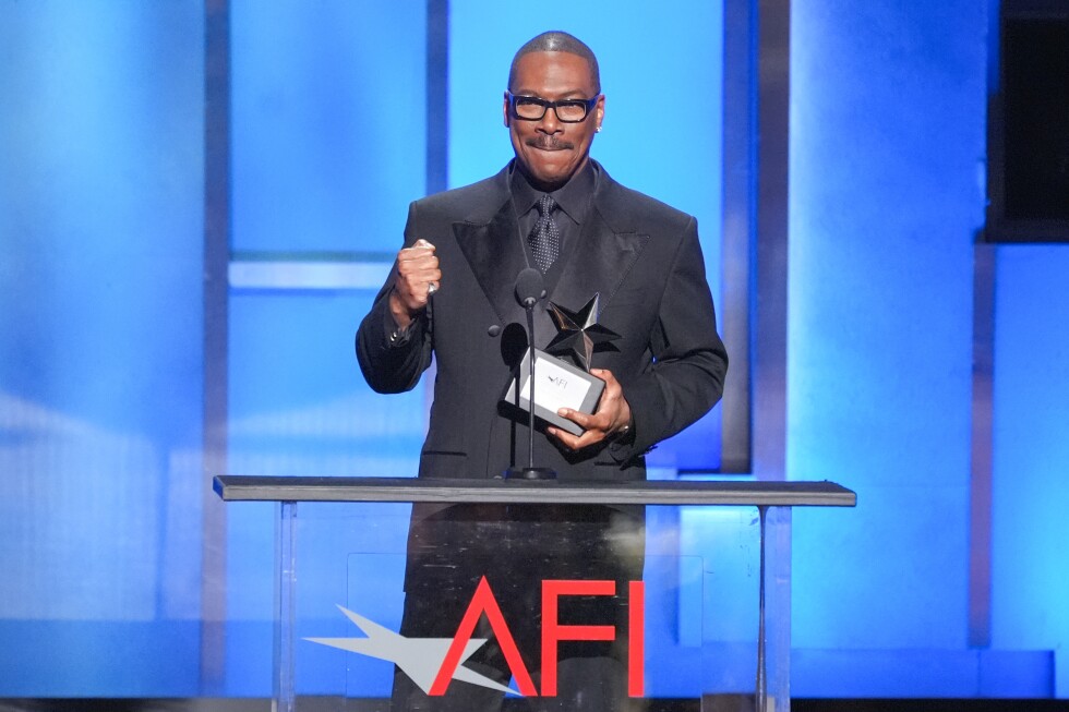 Eddie Murphy receives life achievement award by AFI, drawing standing ovation at star-filled tribute - AP News