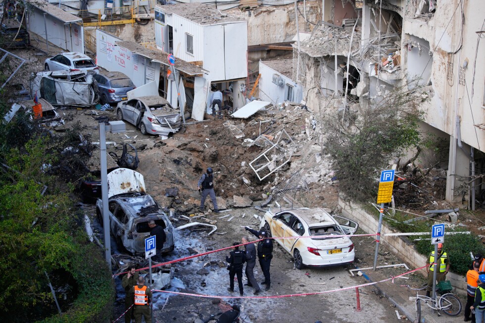 Iran targets Israel and Gulf Arab states even as Trump says US is in talks to end the war - AP News