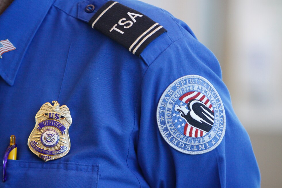 A US Marine is detained after TSA finds a live 25 mm explosive round in his checked bag - AP News