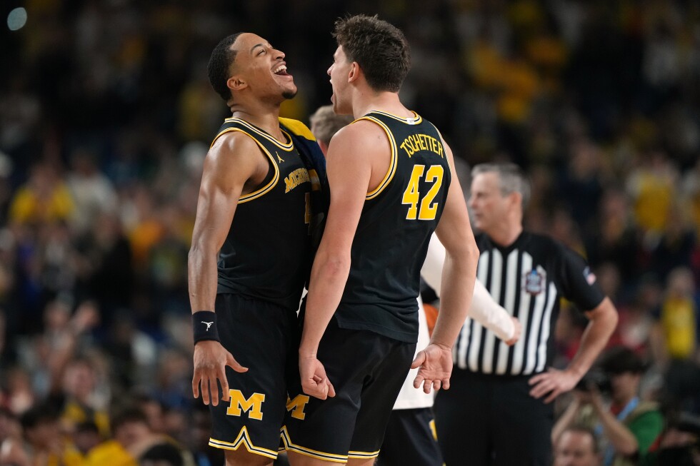 Michigan rolls to national title game with its latest double-digit March win, 91-73 over Arizona - AP News