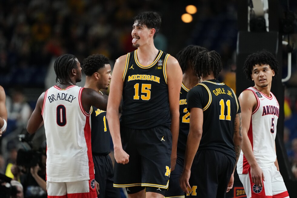 In NCAA title game, a Michigan team on a roll tries to derail a UConn dynasty - AP News