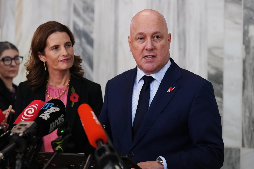 New Zealand Prime Minister Luxon survives party leadership vote months before election - AP News