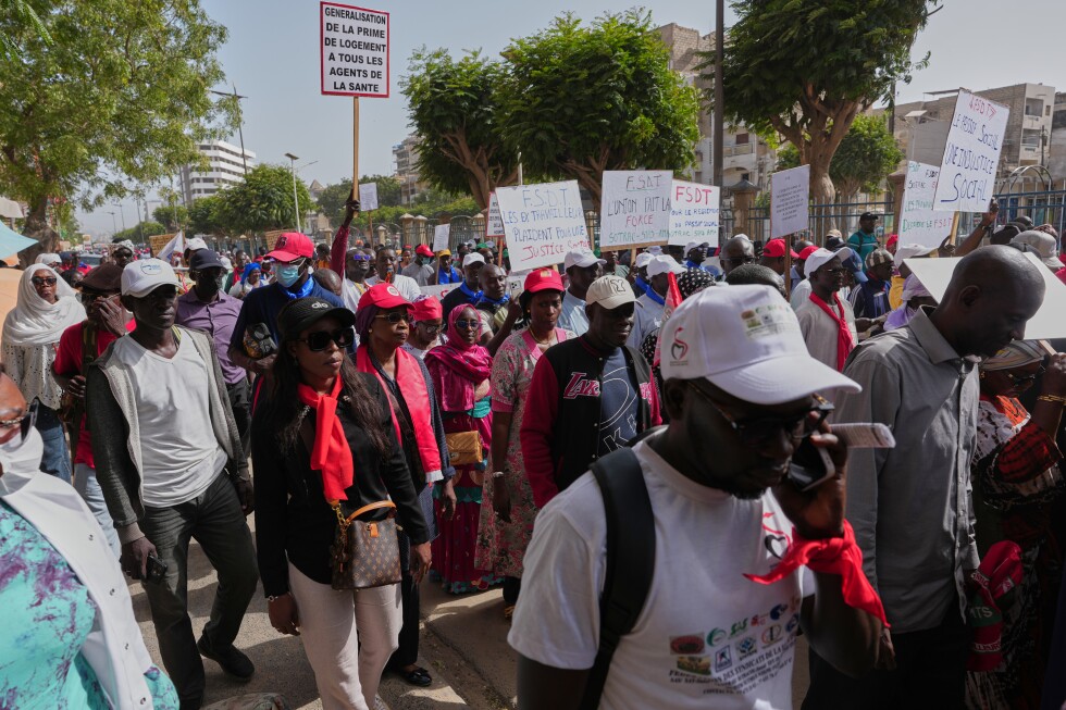 Hundreds march in Senegal’s capital over broken government promises and rising costs - AP News