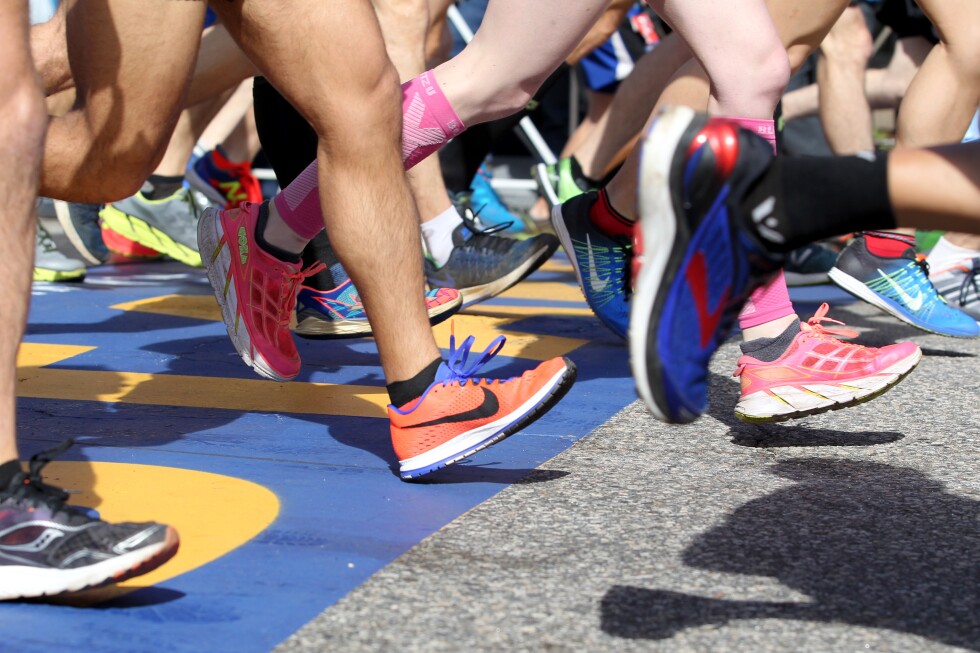 Men caught competing in the women’s category of a prestigious South African marathon - AP News