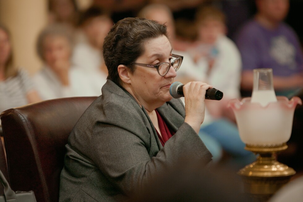 Tennessee librarian fired for refusing to move more than 100 books from children's to adult section - AP News