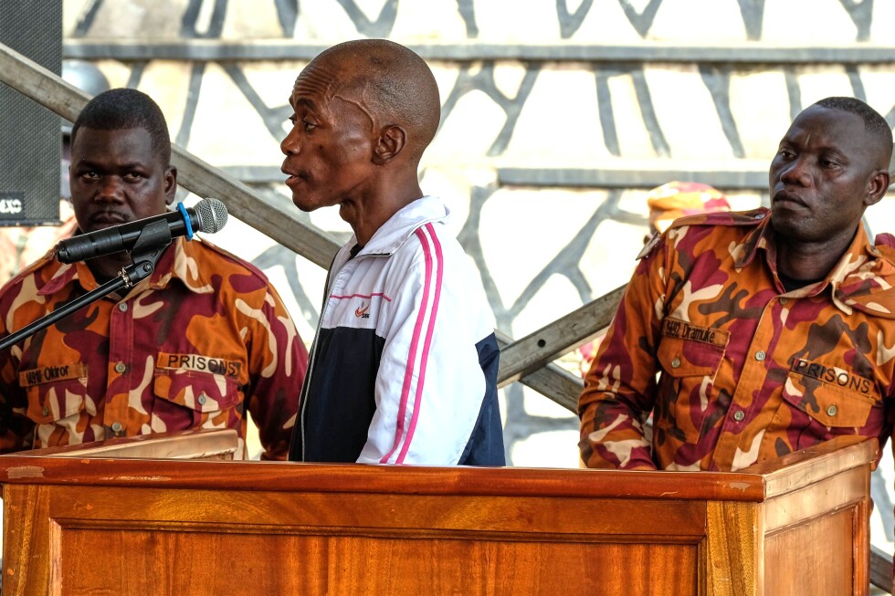 A trial in a tent draws crowds as Uganda debuts mobile court for man accused of killing 4 kids - AP News