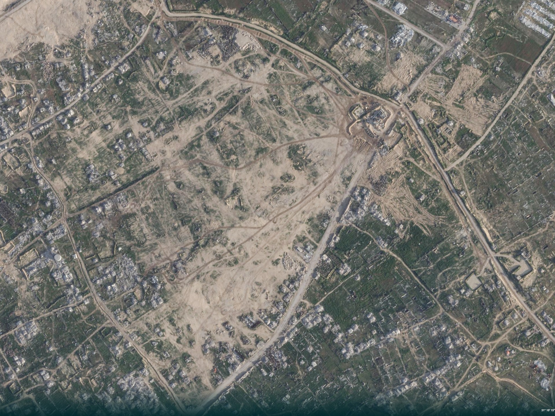 Satellite images reveal Israel expanding Gaza military sites