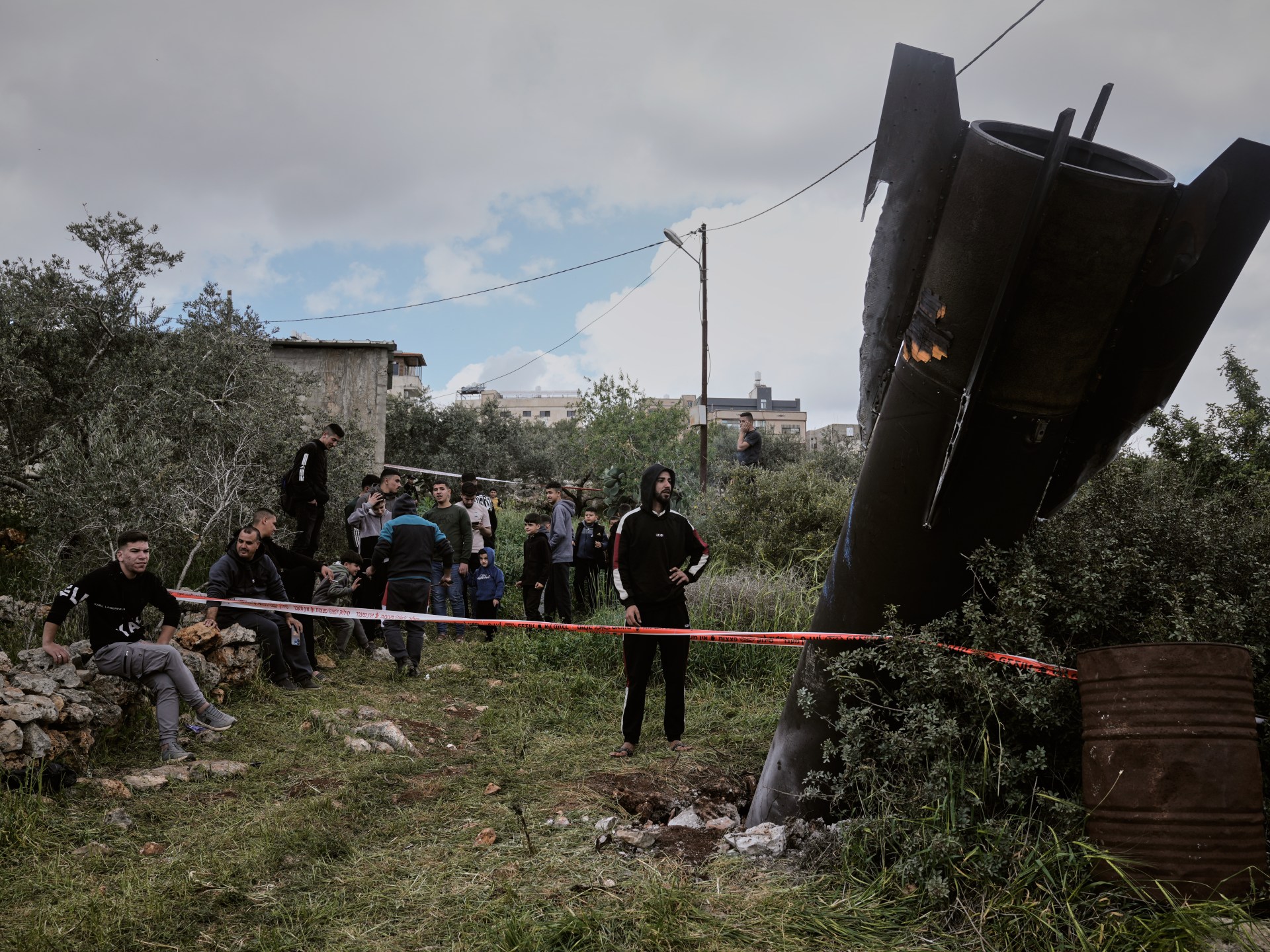 Iran war live: Trump again says talks under way; 12 killed in south Tehran