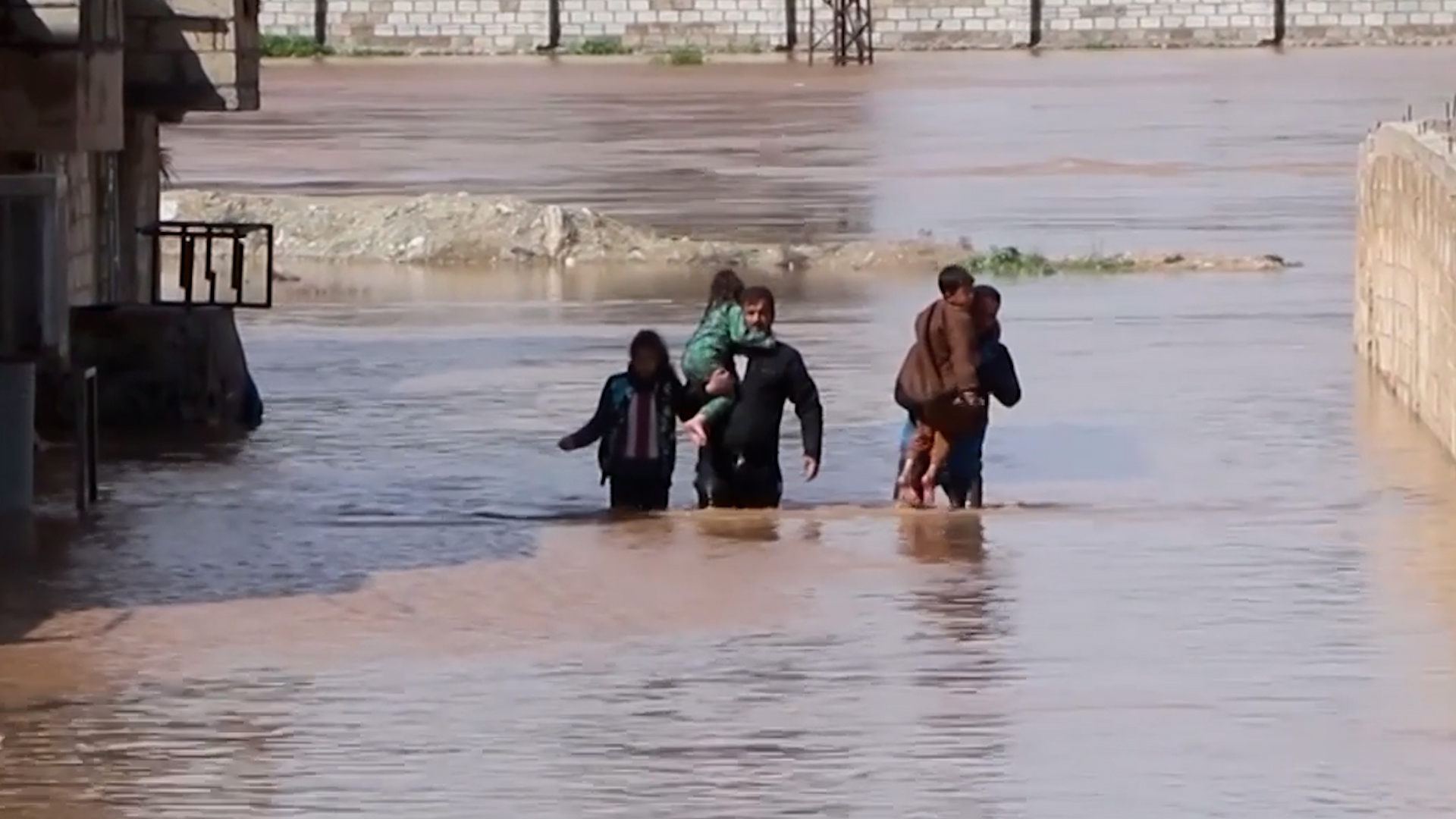 Video: Storms wash away vehicles and flood homes across Middle East
