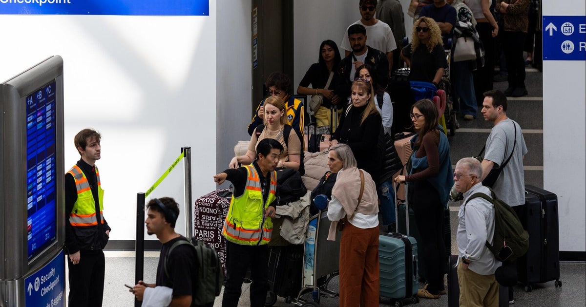 Fliers navigate hours-long TSA wait times as Senate inches toward funding deal