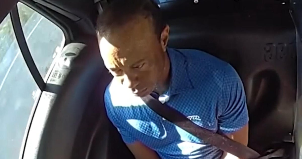 Tiger Woods arrest video shows golf icon saying he just spoke to "the president"