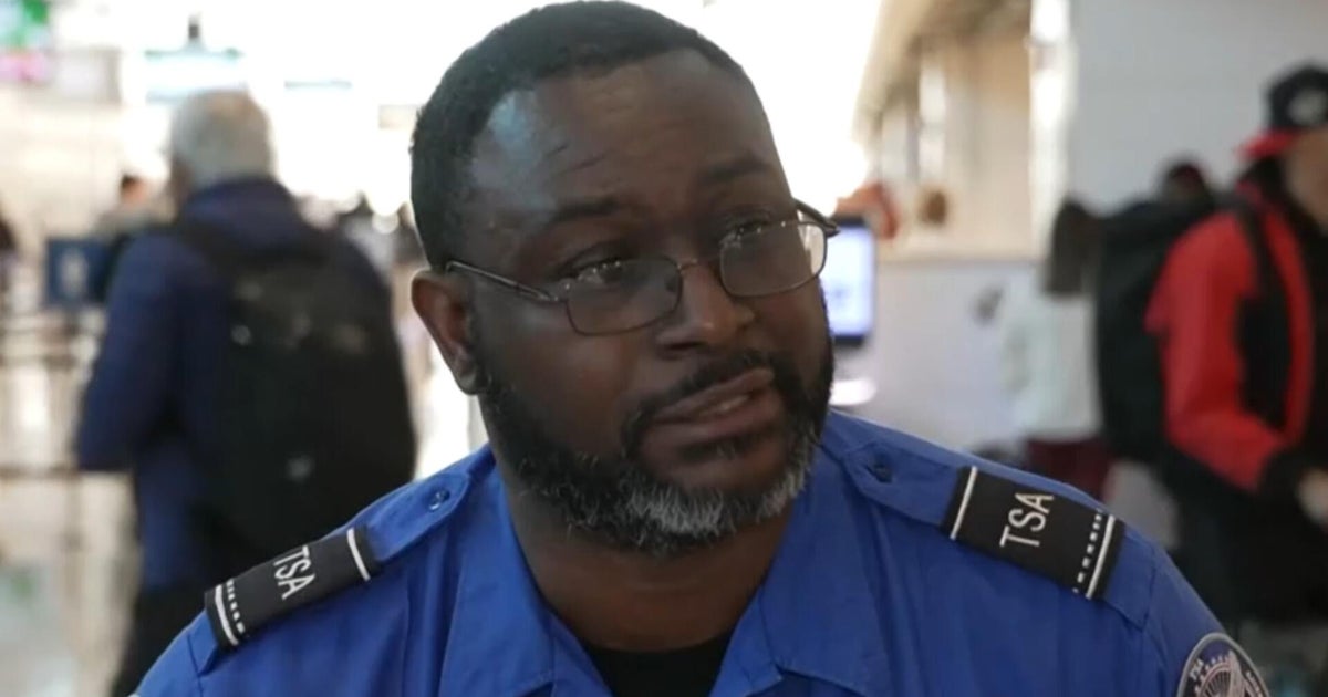 TSA officer's message to lawmakers: "Pay us for what we do"