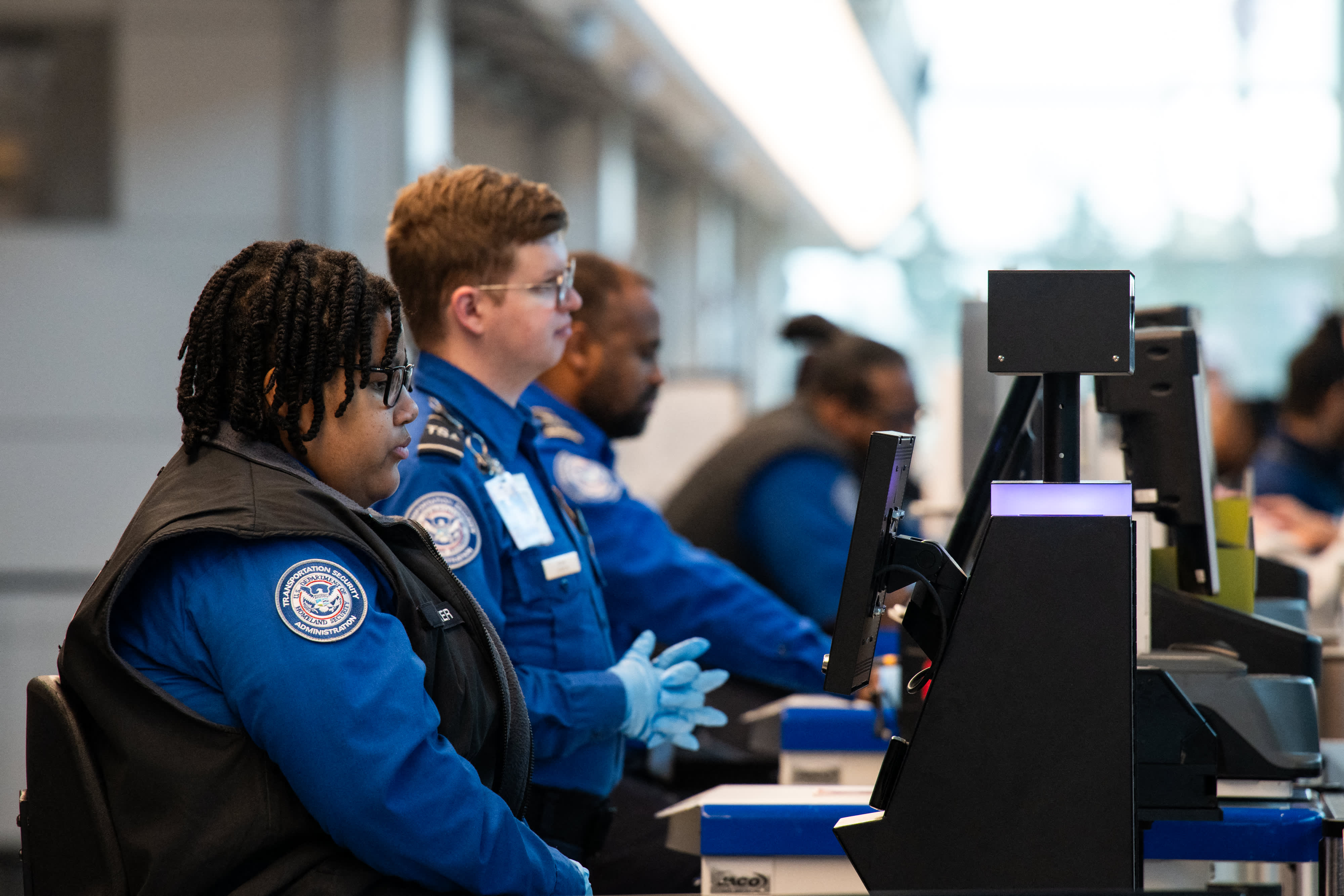 TSA officers will start getting paychecks as early as Monday, DHS says - CNBC