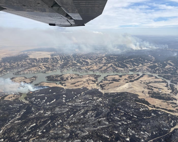 ‘Nothing but tree skeletons’: record-breaking wildfires devastate US cattle country