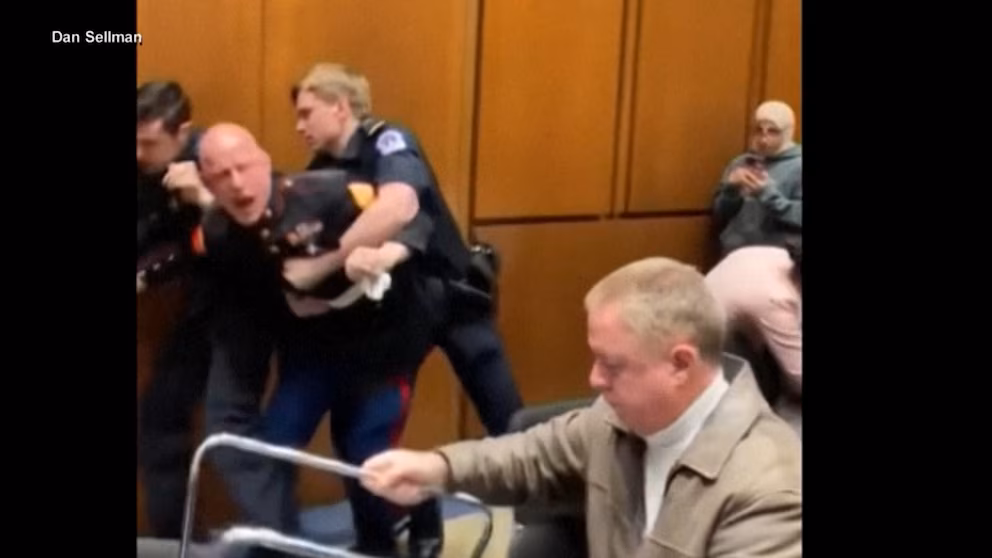WATCH: Senator helps remove protester during Senate hearing