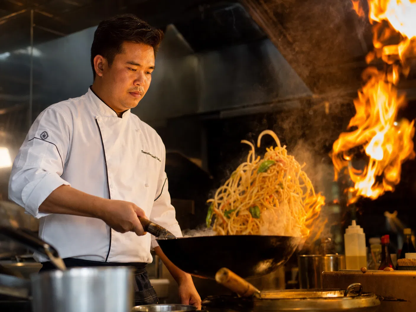 Chef Cooking at Wok Station