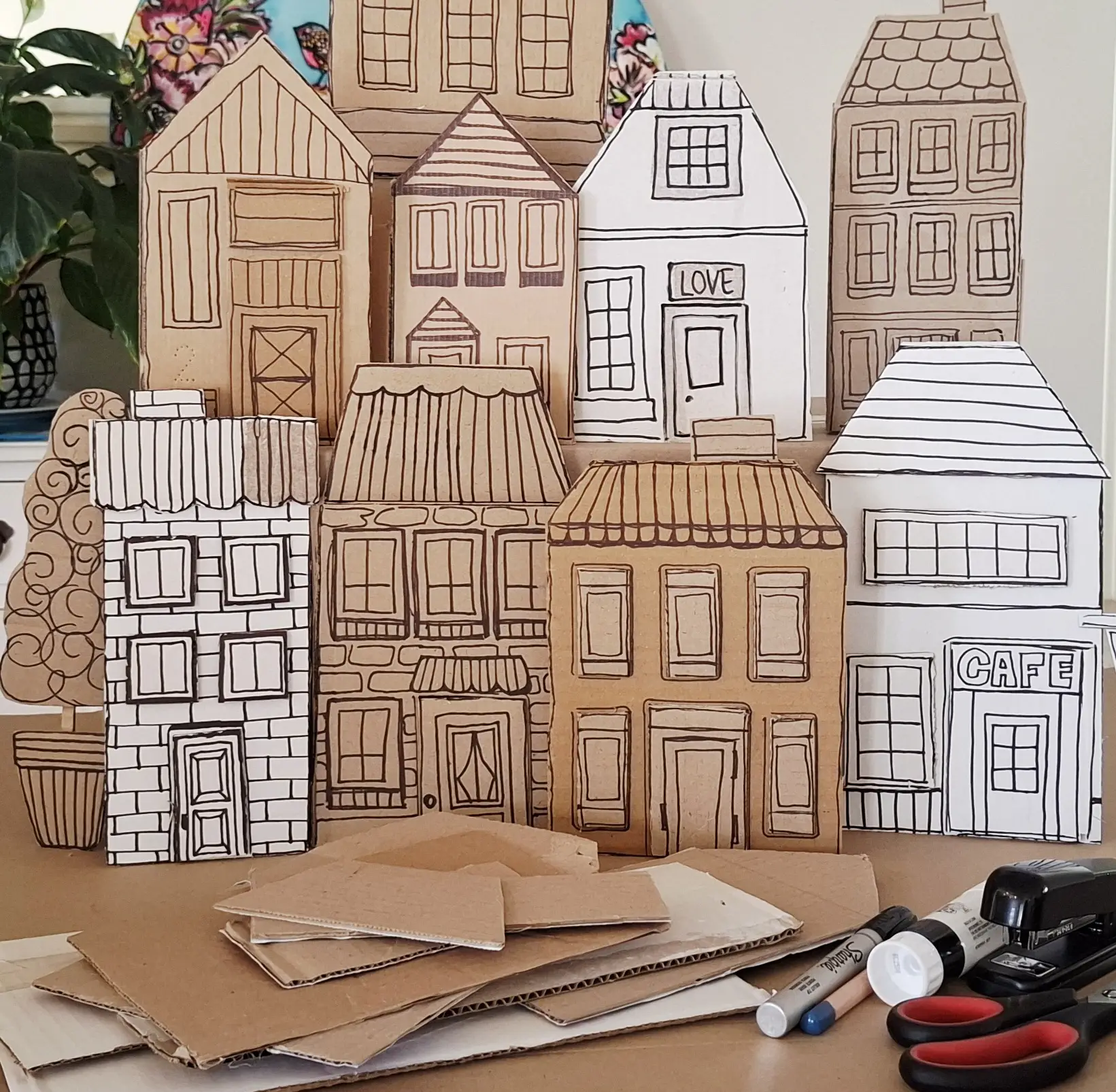 Upcycled cardboard townhouses