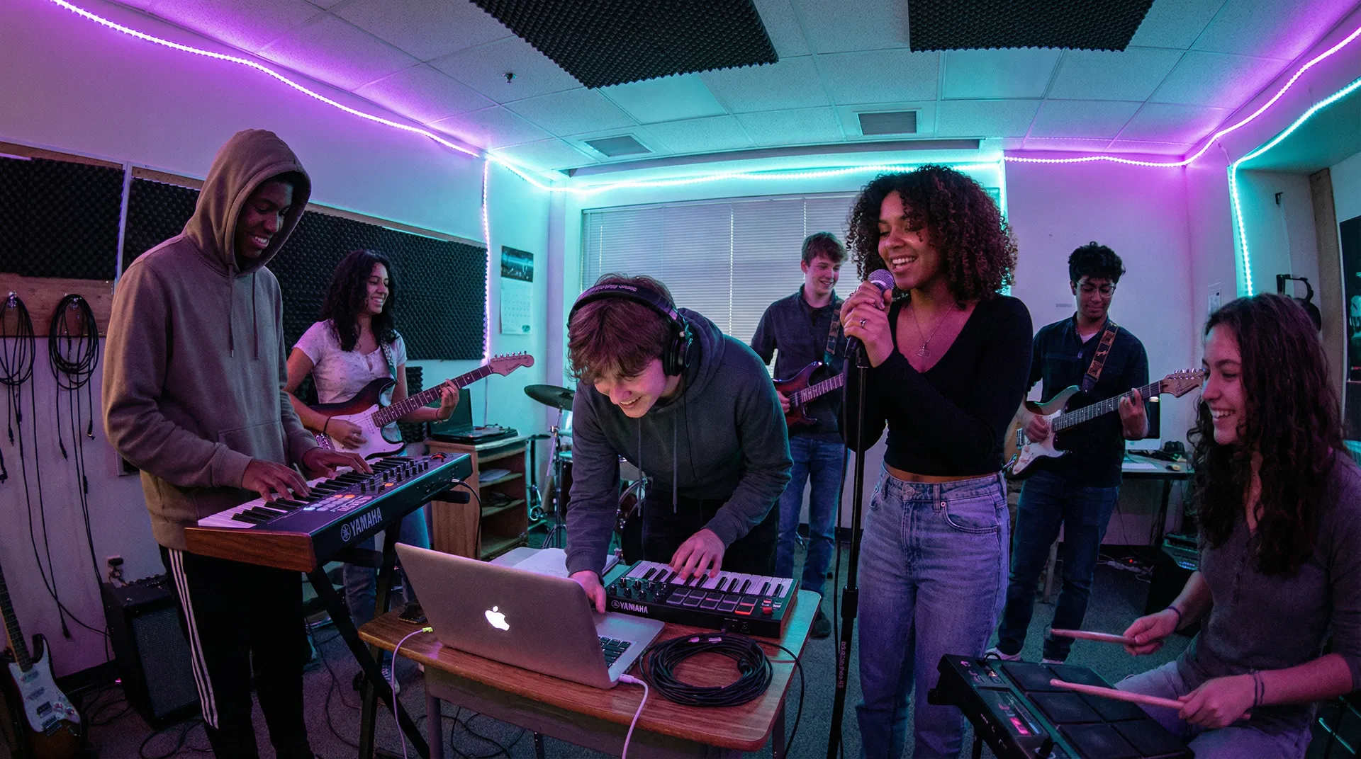 Young people creating music together