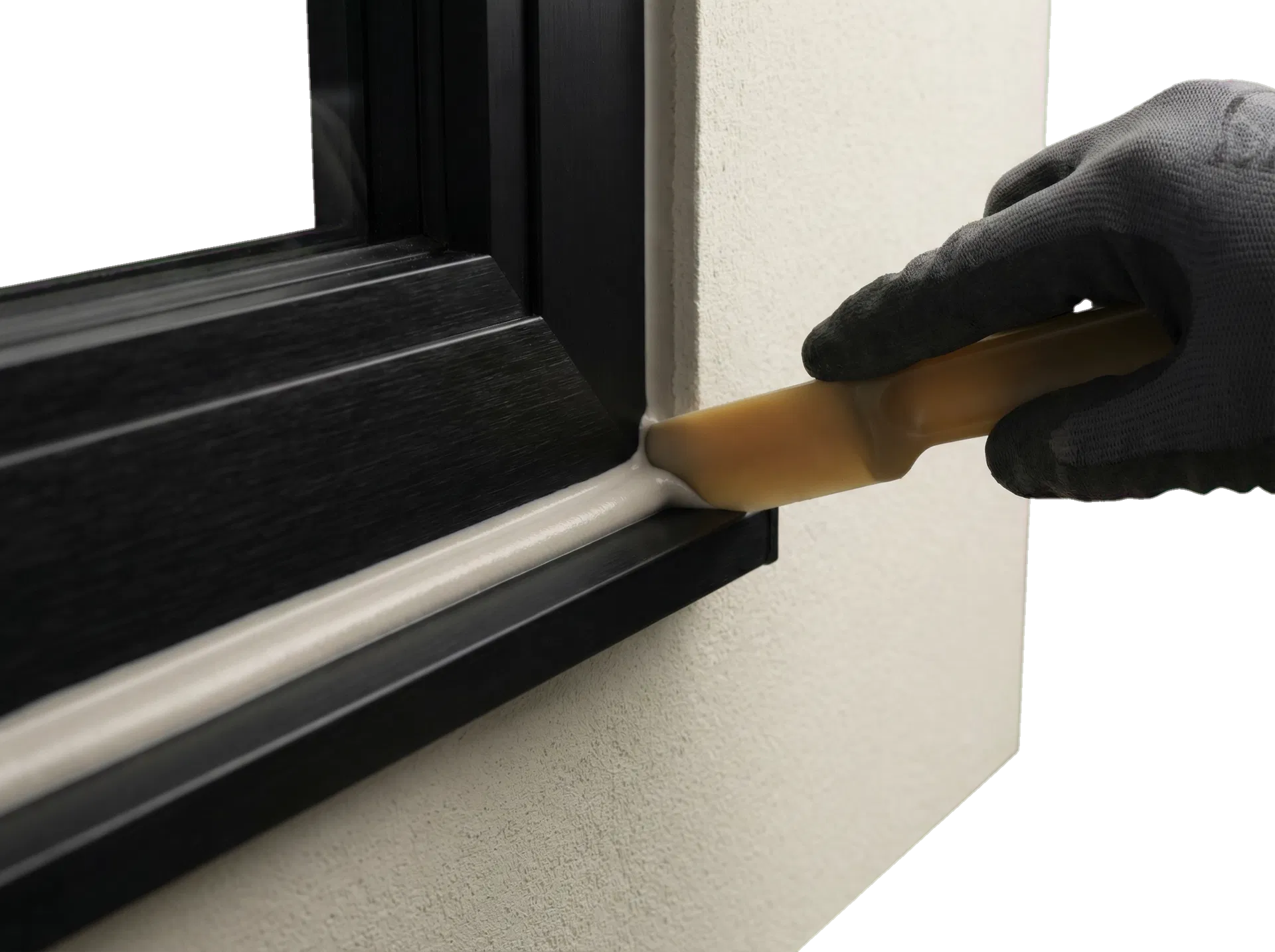 Close-up of a precise silicone joint around a black aluminium frame